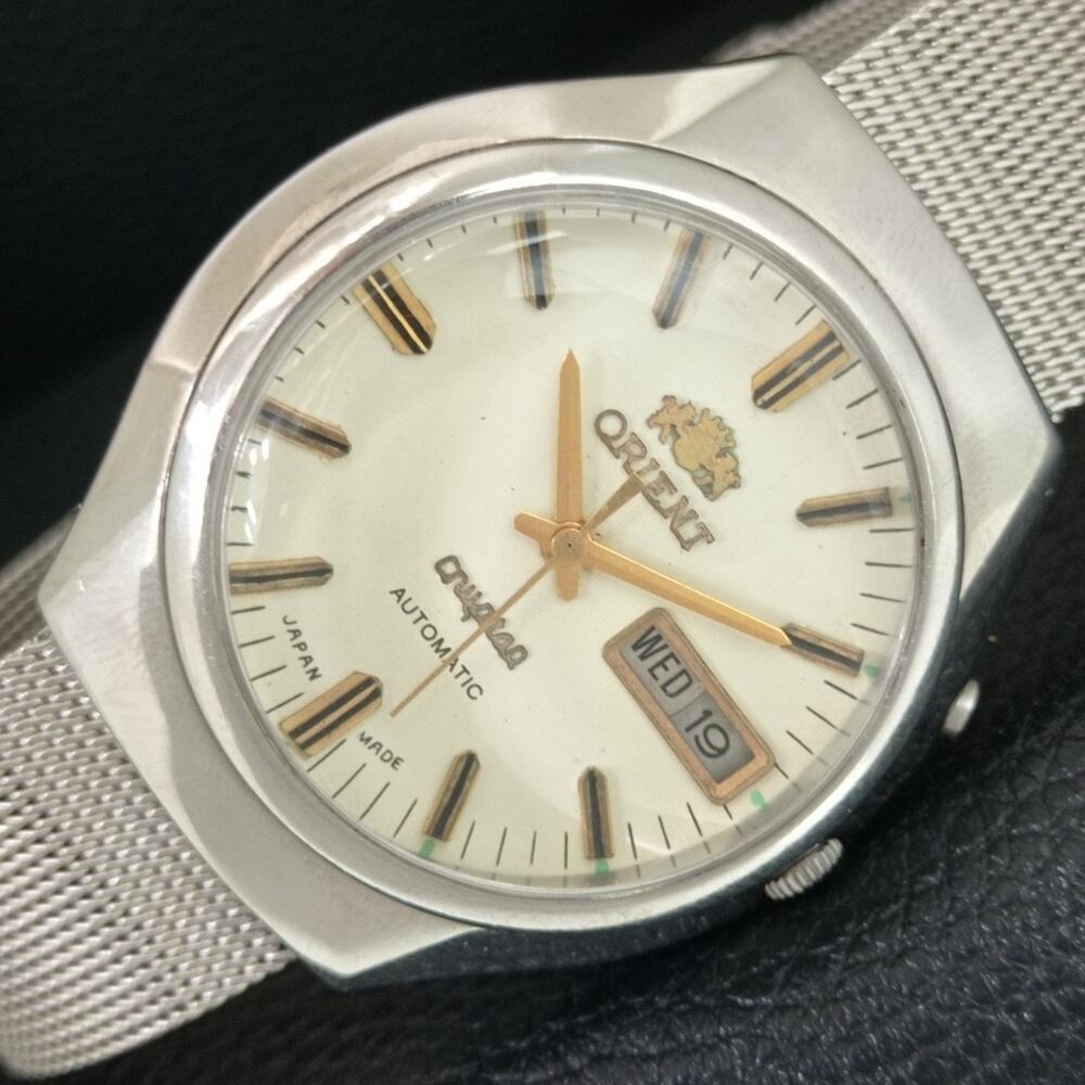 Vintage 1984 Orient Automatic Mens Silver Watch W/daydate & White accents